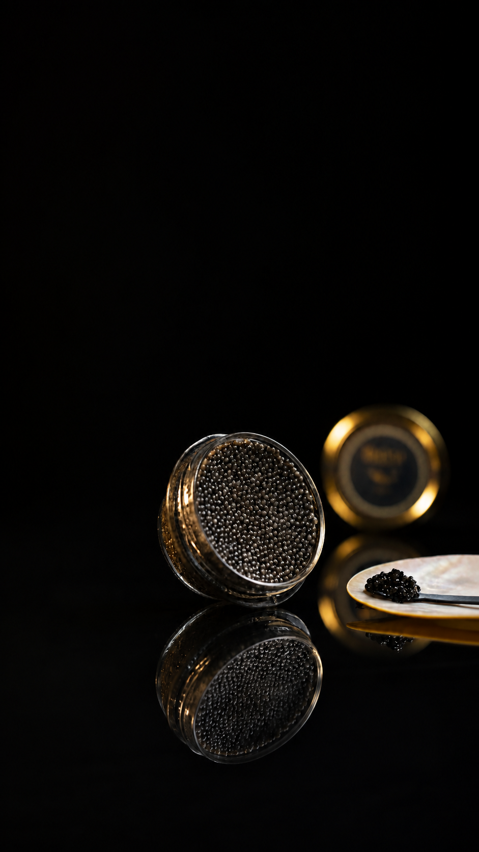 Premium CASPIAN caviar presented against a dramatic dark background